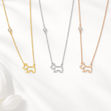  dog-shaped necklaces in gold, silver, and rose gold