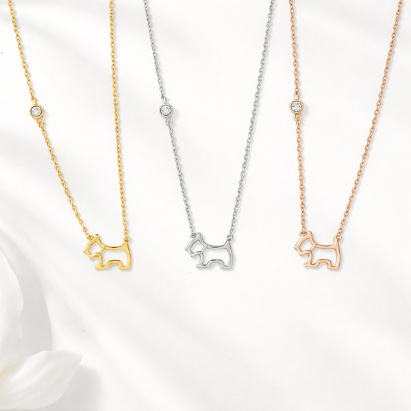  dog-shaped necklaces in gold, silver, and rose gold