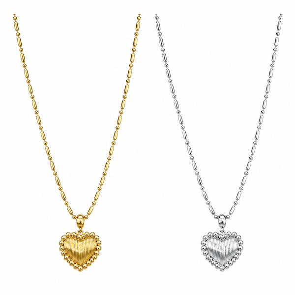 Gold and silver heart-shaped pendants on chains against a white background
