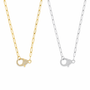 Two necklaces, one gold and one silver, with similar pendants 