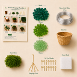 Materials included in the classic green beaded hanging plant DIY kit with silver craft wire and 14 eye hooks